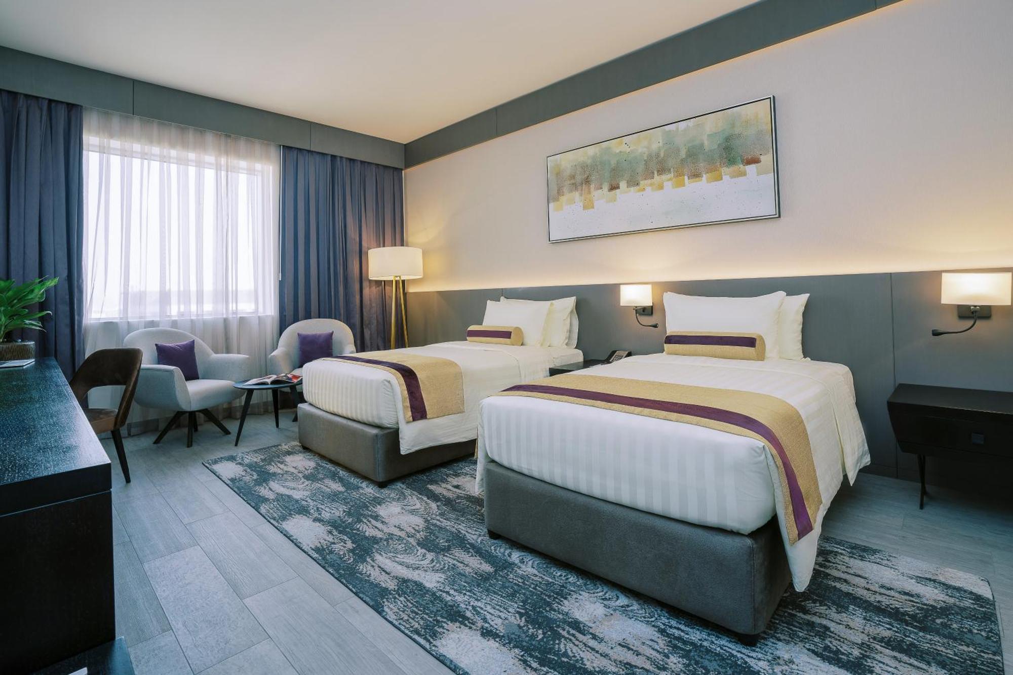 Deluxe Twin Room on F&B shuttle to Deira City Center Al Ghurair Mall & La Mer Beach